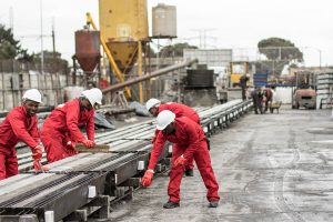 Construction Workers with Concrete Panels